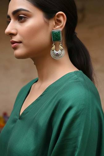 Green color oxidised earrings created with dual-tone textures to elevate cultural celebration outfits