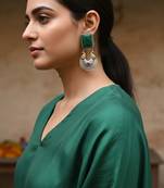 Green color oxidised earrings created with dual-tone textures to elevate cultural celebration outfits