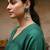 Green color oxidised earrings created with dual-tone textures to elevate cultural celebration outfits