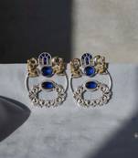 Blue color oxidised earrings designed with stunning dual-tone detailing for bold festive fashion