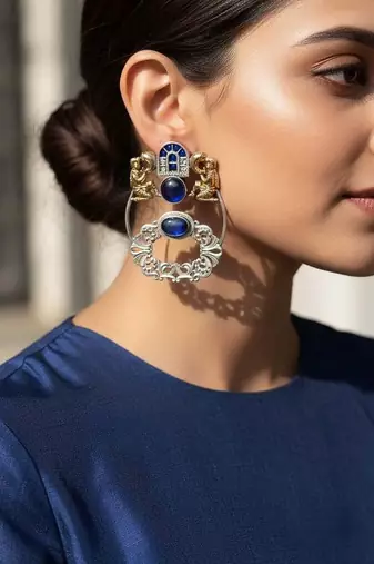 Blue color oxidised earrings designed with stunning dual-tone detailing for bold festive fashion