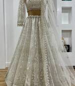 White sequins and thread work net lehenga Choli With Dupatta