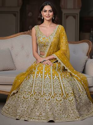 yellow zari work soft net lehenga set choli with dupatta 2