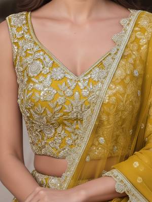 yellow zari work soft net lehenga set choli with dupatta 5