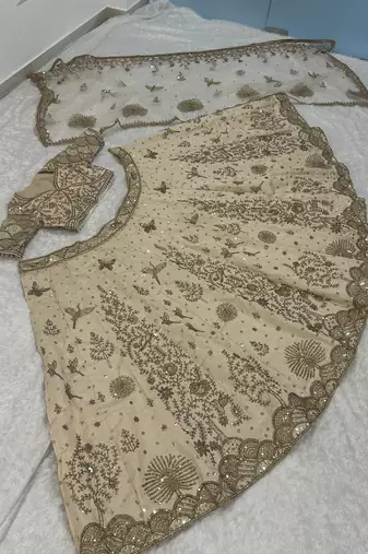 Cream net sequins dori & Zari Lehenga blouse with Dupatta
