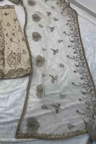 Cream net sequins dori & Zari Lehenga blouse with Dupatta