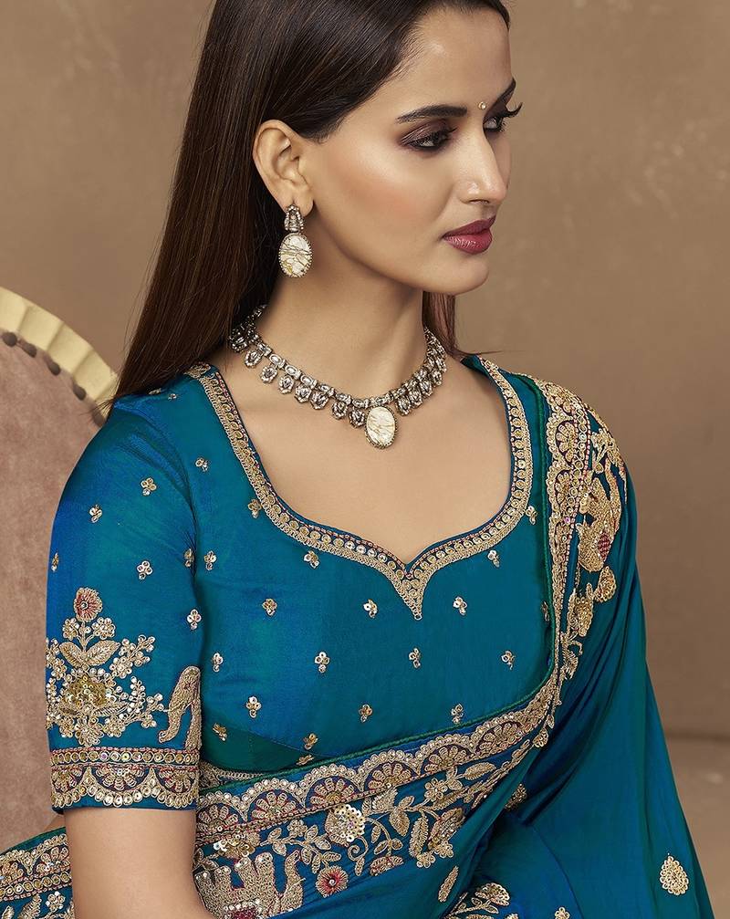 Dark teal embroidered pramium satin saree with designer blouse fabric