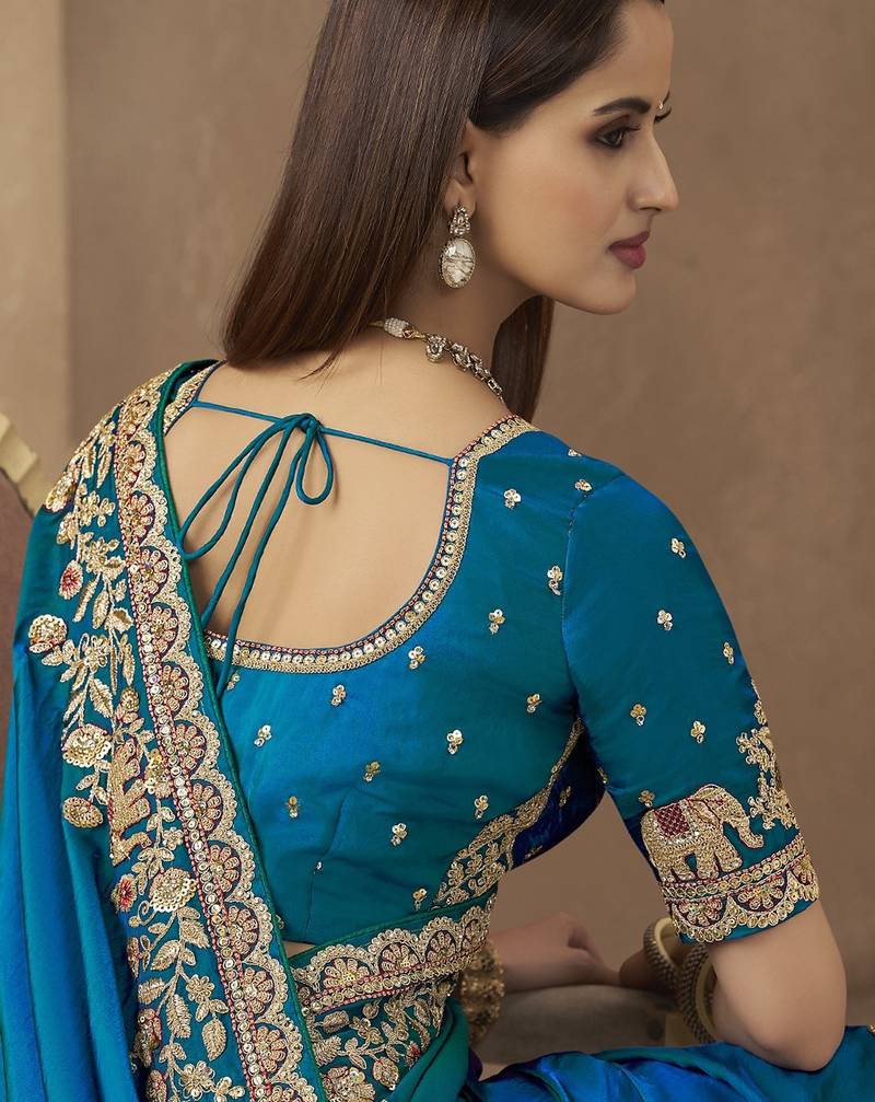 Dark teal embroidered pramium satin saree with designer blouse fabric