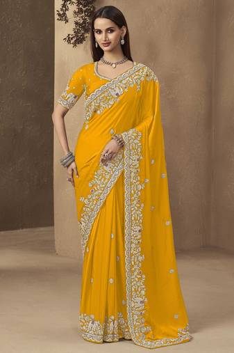 Yellow embroidered pramium satin saree with designer blouse fabric