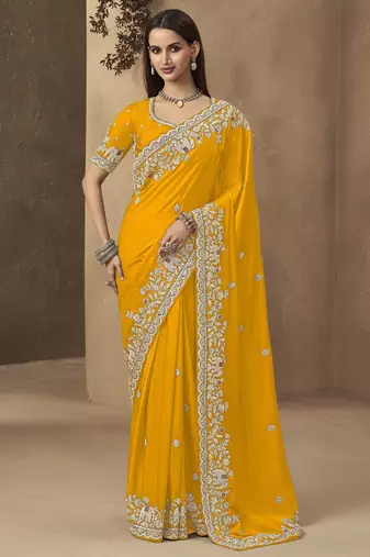 Yellow embroidered pramium satin saree with designer blouse fabric
