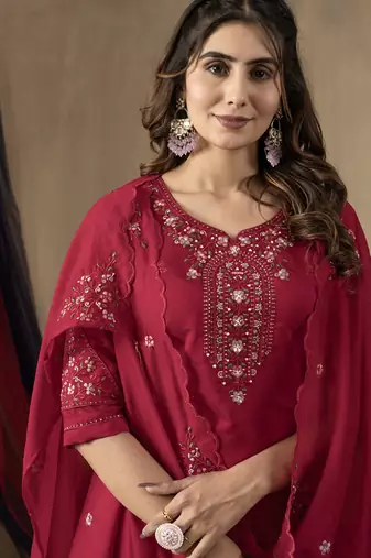 Rani pink roman silk thread embroidered salwar suit