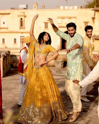 yellow georgette embroidered lehenga choli with dupatta 1