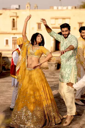 yellow georgette embroidered lehenga choli with dupatta