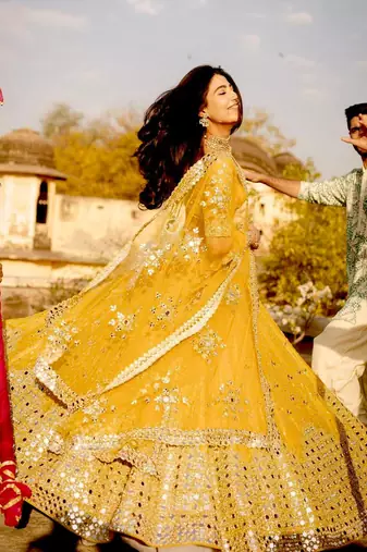 yellow georgette embroidered lehenga choli with dupatta