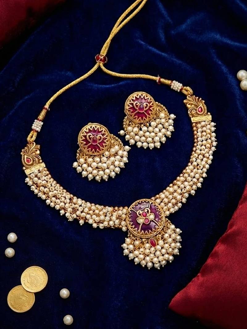 Traditional meenakari pearl jewelry set with pota stone detailing