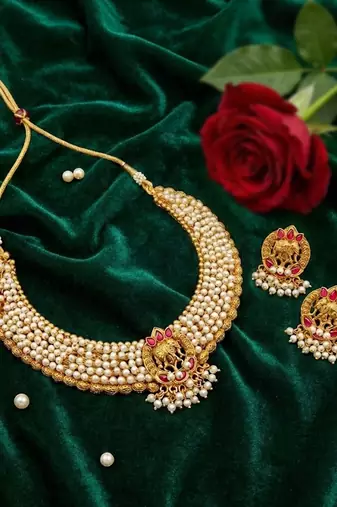 Matte gold finish pendant pearl chain necklace set with elephant design