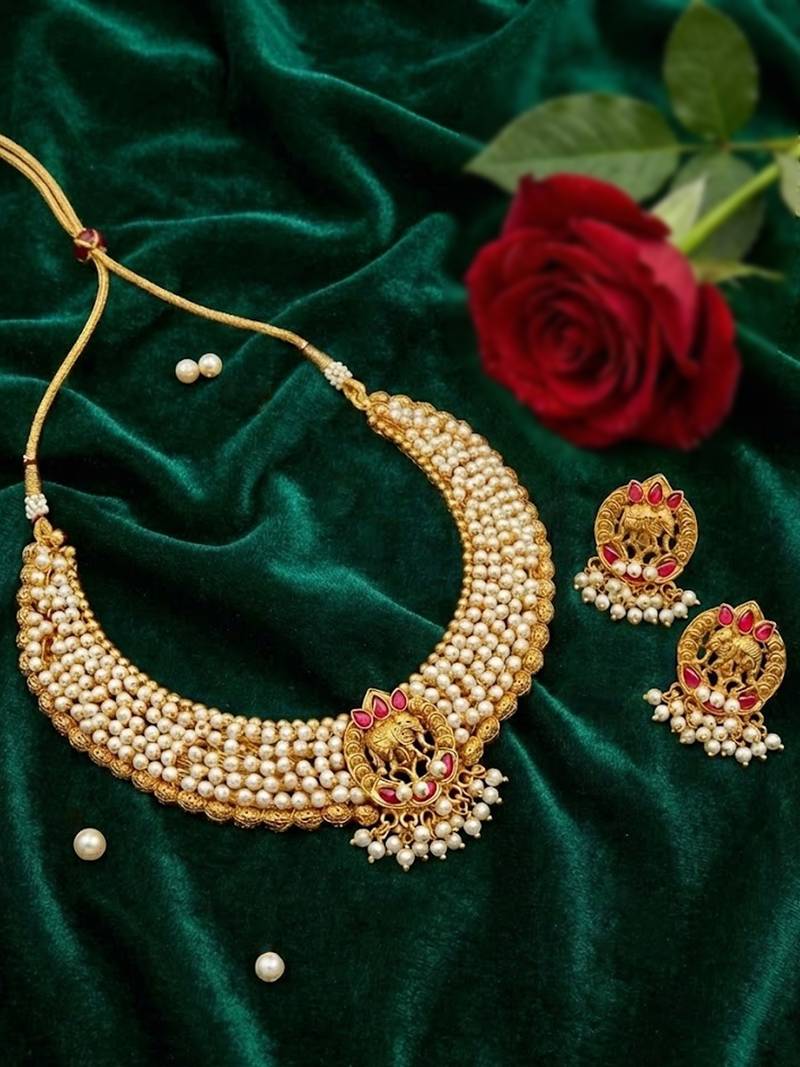 Matte gold finish pendant pearl chain necklace set with elephant design