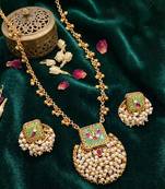 Gold finish pendant necklace set with kundan polki and ruby stones
