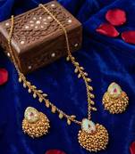 Temple pendant set in antique gold finish