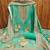 green printed cotton semi_stitched churidar dress-materials
