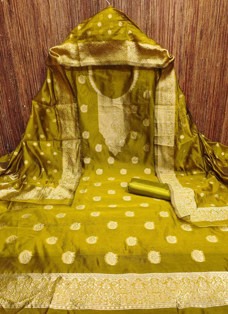 Green woven shimmer semi stitched churidar dress-materials