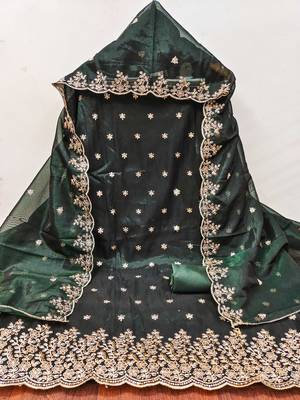 Green embroidered net churidar dress-materials 2