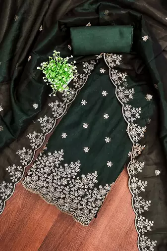 Green embroidered net churidar dress-materials