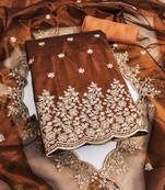 Orange embroidered net semi stitched churidar dress-materials