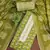Green printed cotton semi stitched churidar dress-materials