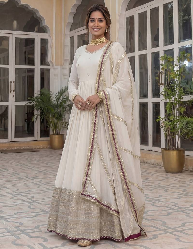 Gorgeous Off-White Embroidered Silk Wedding Wear Gown With Dupatta