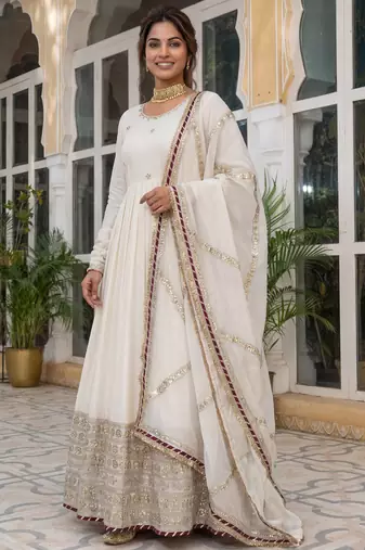 Gorgeous Off-White Embroidered Silk Wedding Wear Gown With Dupatta