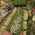 Green embroidered cotton semi stitched churidar dress-materials