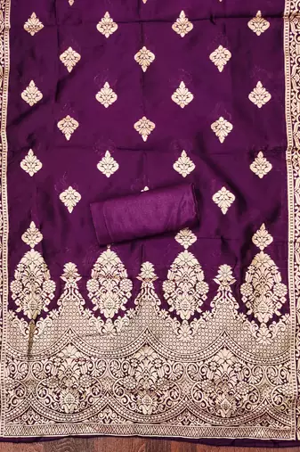 Purple woven shimmer churidar dress-materials