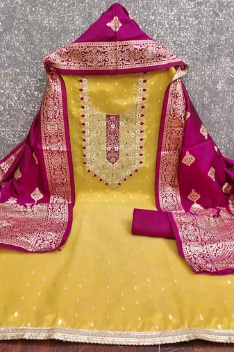 Yellow woven shimmer churidar dress-materials