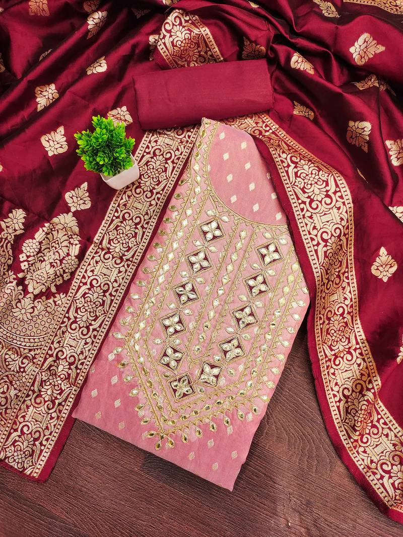 Pink woven shimmer semi stitched churidar dress-materials