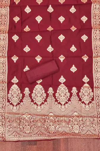 Pink woven shimmer churidar dress-materials