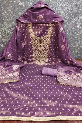 Purple woven shimmer churidar dress-materials