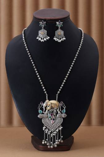Multi color dual tone oxidised necklace set featuring vibrant designs for festive traditional styling