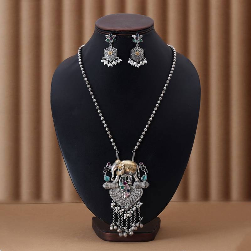 Multi color dual tone oxidised necklace set featuring vibrant designs for festive traditional styling