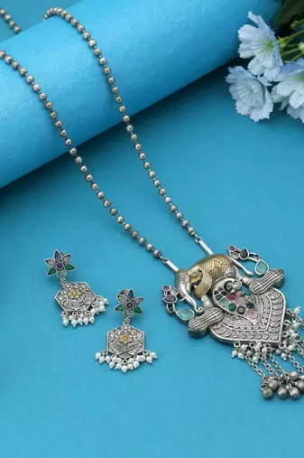 Multi color dual tone oxidised necklace set featuring vibrant designs for festive traditional styling