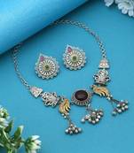 Multi color dual tone oxidised necklace set enhanced with artistic motifs for timeless ethnic charm