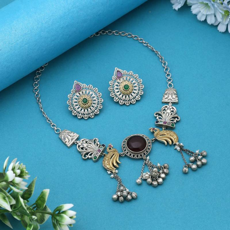 Multi color dual tone oxidised necklace set enhanced with artistic motifs for timeless ethnic charm