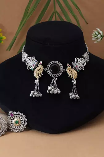 Multi color dual tone oxidised necklace set enhanced with artistic motifs for timeless ethnic charm