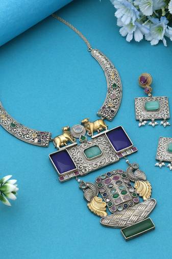 Multi color dual tone oxidised necklace set reflecting cultural artistry with striking decorative details