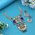 Multi color dual tone oxidised necklace set reflecting cultural artistry with striking decorative details