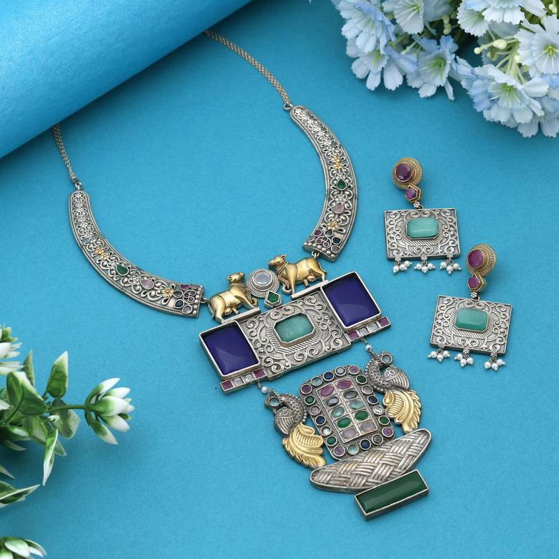 Multi color dual tone oxidised necklace set reflecting cultural artistry with striking decorative details