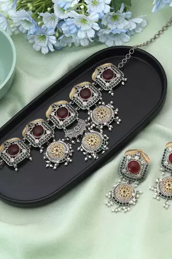 Red color choker dual tone oxidised necklace set showcasing bold hues and refined oxidised work