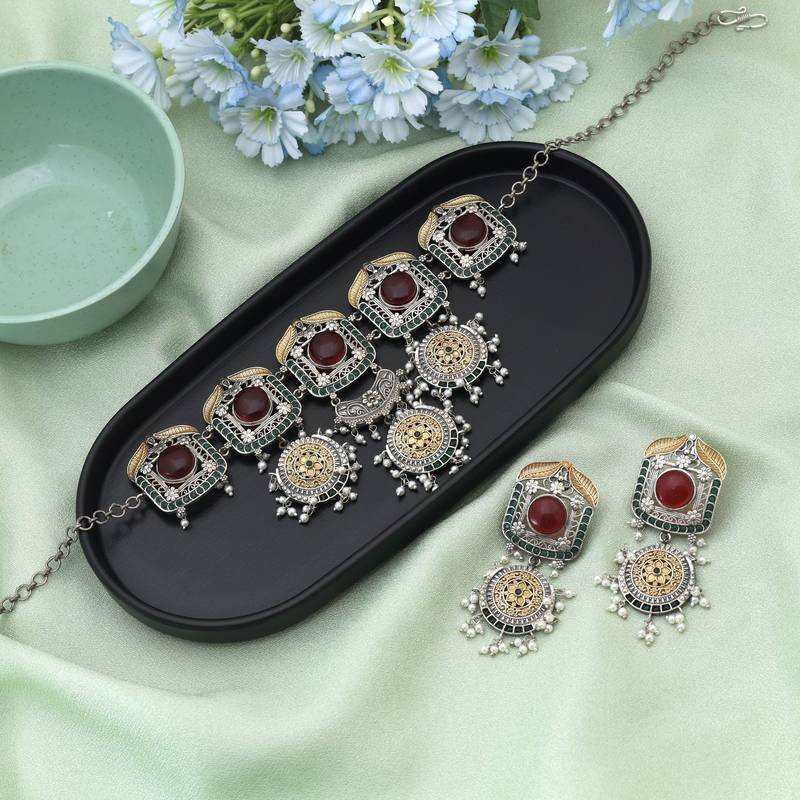 Red color choker dual tone oxidised necklace set showcasing bold hues and refined oxidised work