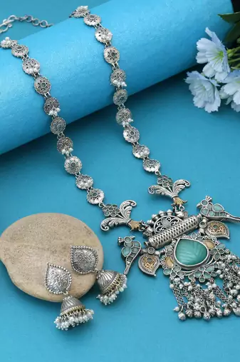 Pista green color dual tone oxidised necklace set infused with refreshing tones and detailed metalwork
