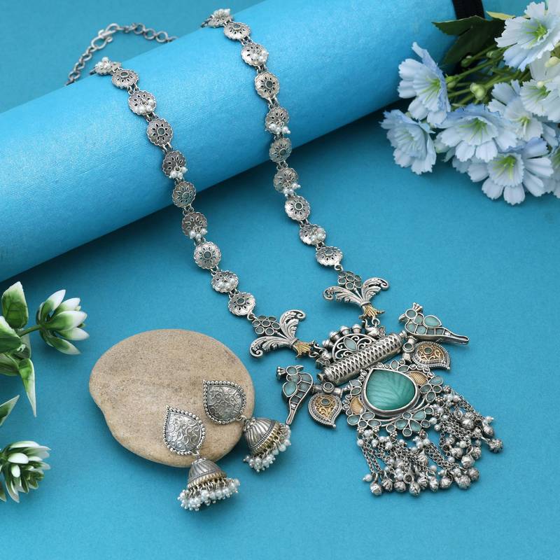 Pista green color dual tone oxidised necklace set infused with refreshing tones and detailed metalwork